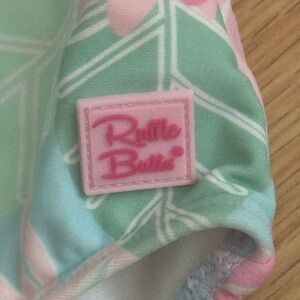 Ruffle Butts White and Pink Tag on piece swim